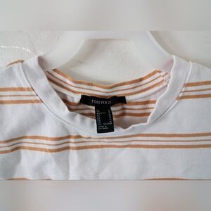 "Your Summer Wardrobe MVP: Elevate Your Style with This Must-Have Top!"